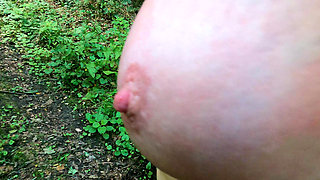 Spanking Her Big Tits in the Woods