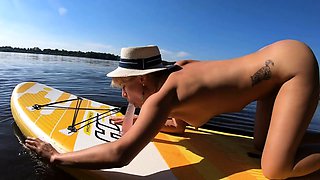 Blonde MILF Plays with Dildo and Gives Blowjob on a SUP Boar