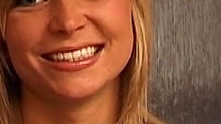 Horny Blonde MILF Smiles Seductively Ready for Filthy Fun