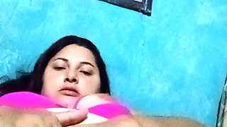 Chubby Latina with big tits chews her rich wet pussy