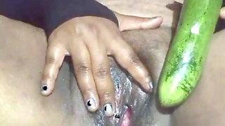Today, Indian Bhabhi Quenched Her Desire by Inserting a Cucumber Into Her Pussy