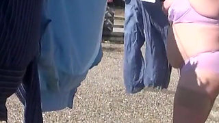 Trisha hanging out the washing