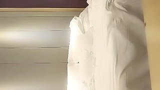 Cute amateur asian web cam girl playing with her toy