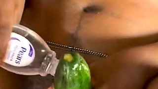 Sexy Ebony Fucks a Huge Cucumber and Tries Anal with a Butt Plug