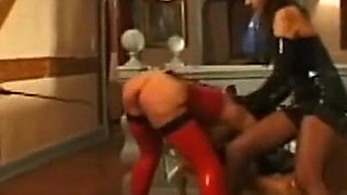 Latex masked guy and babe humiliating