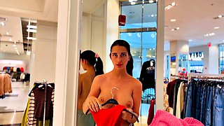 Busty Brunette Flashes in Store