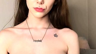 Small titted brunette teen fingering on the bed
