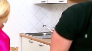 He fucks a hot milf with big boobs in her kitchen