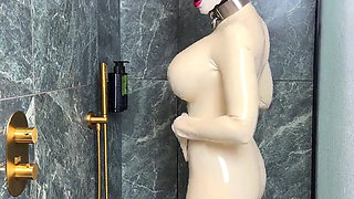 Latex Cow Undressing Under the Shower