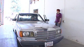 Big boobed redhead babe fucks her car worker