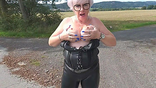 German Granny with Huge Boobs Gets Horny on a Walk Outdoors an Shows Her Big Tits!