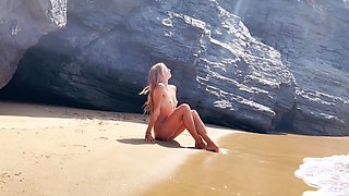 skinny teen gets horny on the public beach