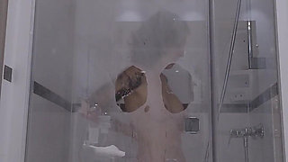 A Slut Dildos Herself During Her Shower, Comes to Watch on Her Through the Transparent Glass Window