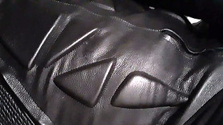 Biker cums in leather moto race suit
