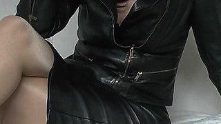 Leather-clad Dominatrix on a Cigarette Break, Part 4 - Lady Victoria Valente