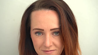 Extreme Close up Blue Eyed Redhead Smoking