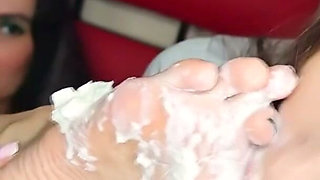 Two Lesbians Licking Whipped Cream off Each Other's Feet