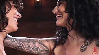 Two mistresses have fun with slave