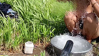 The desi stepsister of the village is bathing openly in the open field, bathing naked in the forest, brother-in-law is secretly