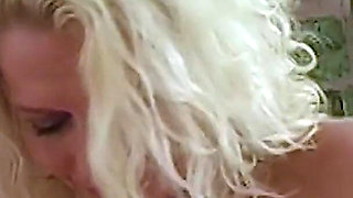 Blonde mature rubs her big clit and wet pussy