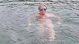 Sexy Granny Swims Naked in a Lake!