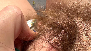 Amateur Hairy Girl Mastubates in Closeup with Huge Clit