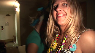 Festive girls naked fun on the bed