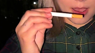 Smoking Blonde with Naked Tits Smokes!