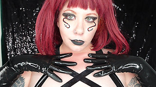Gothic Demoness Tease in Latex Gloves and Cleavage