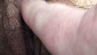 Masturbating