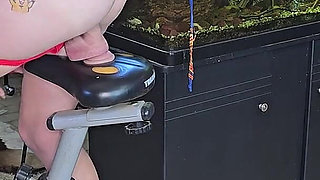 Cute 19 Year Old Blonde Riding Excersize Bike with Massive Dildo